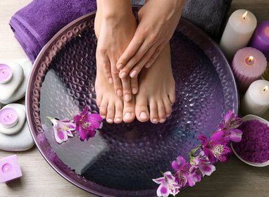 Person getting their feet treated at our salon in Macomb County, MI