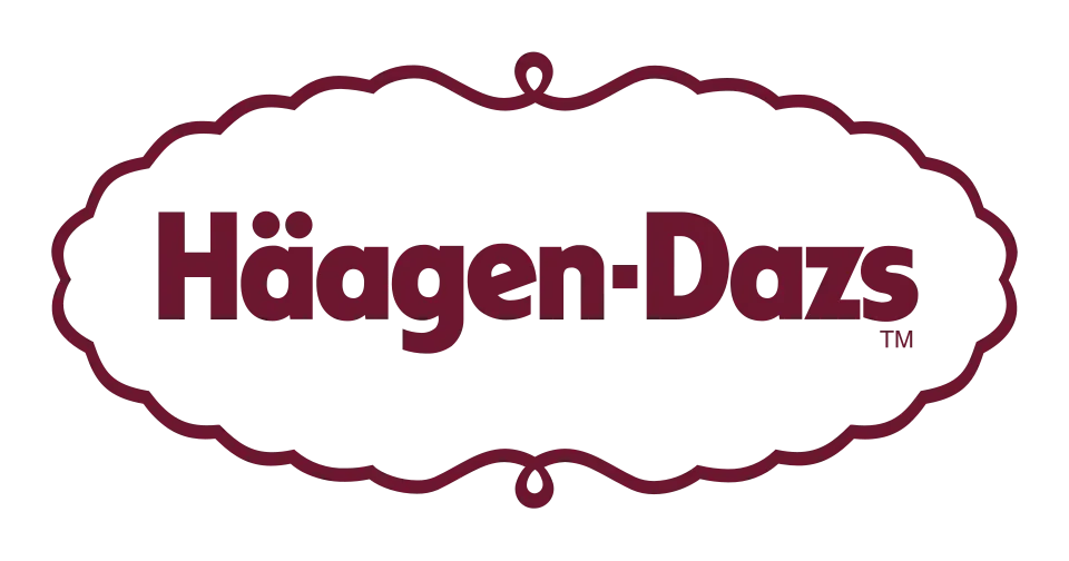 Le logo Häagen-Dazs rouge foncé, avec le nom de la marque centré à l'intérieur d'une bordure ovale décorative festonnée.