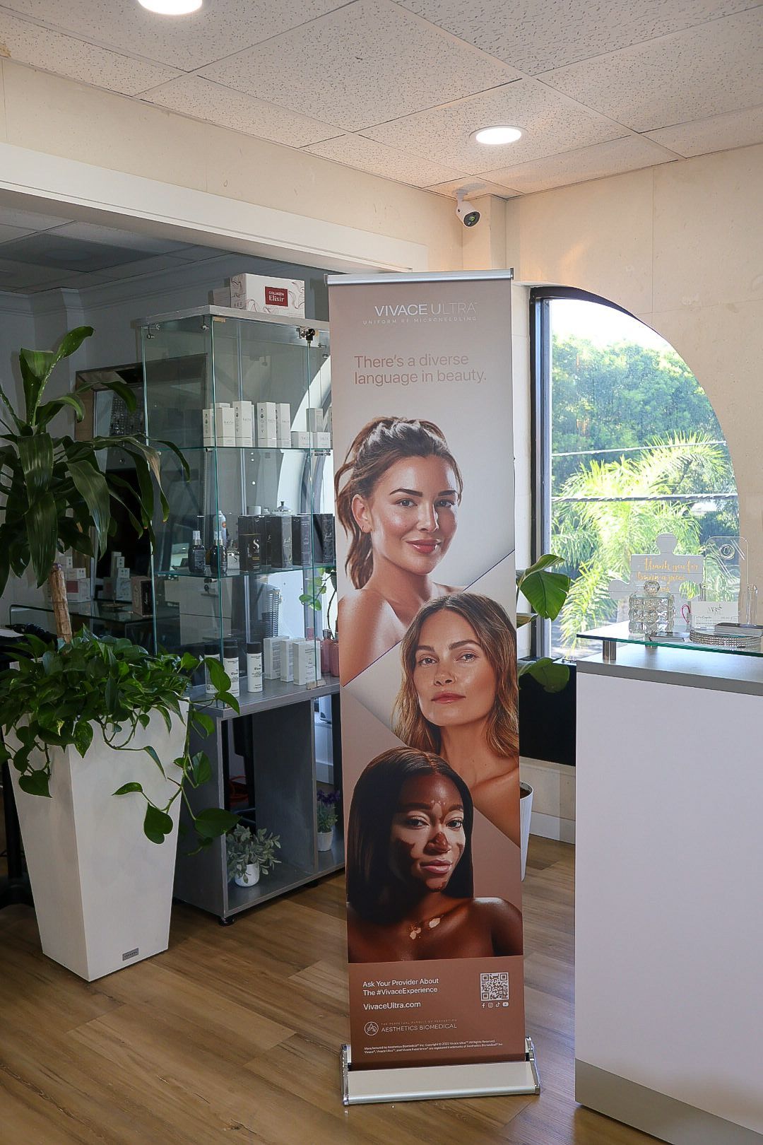 A sign in a salon with a picture of three women on it.