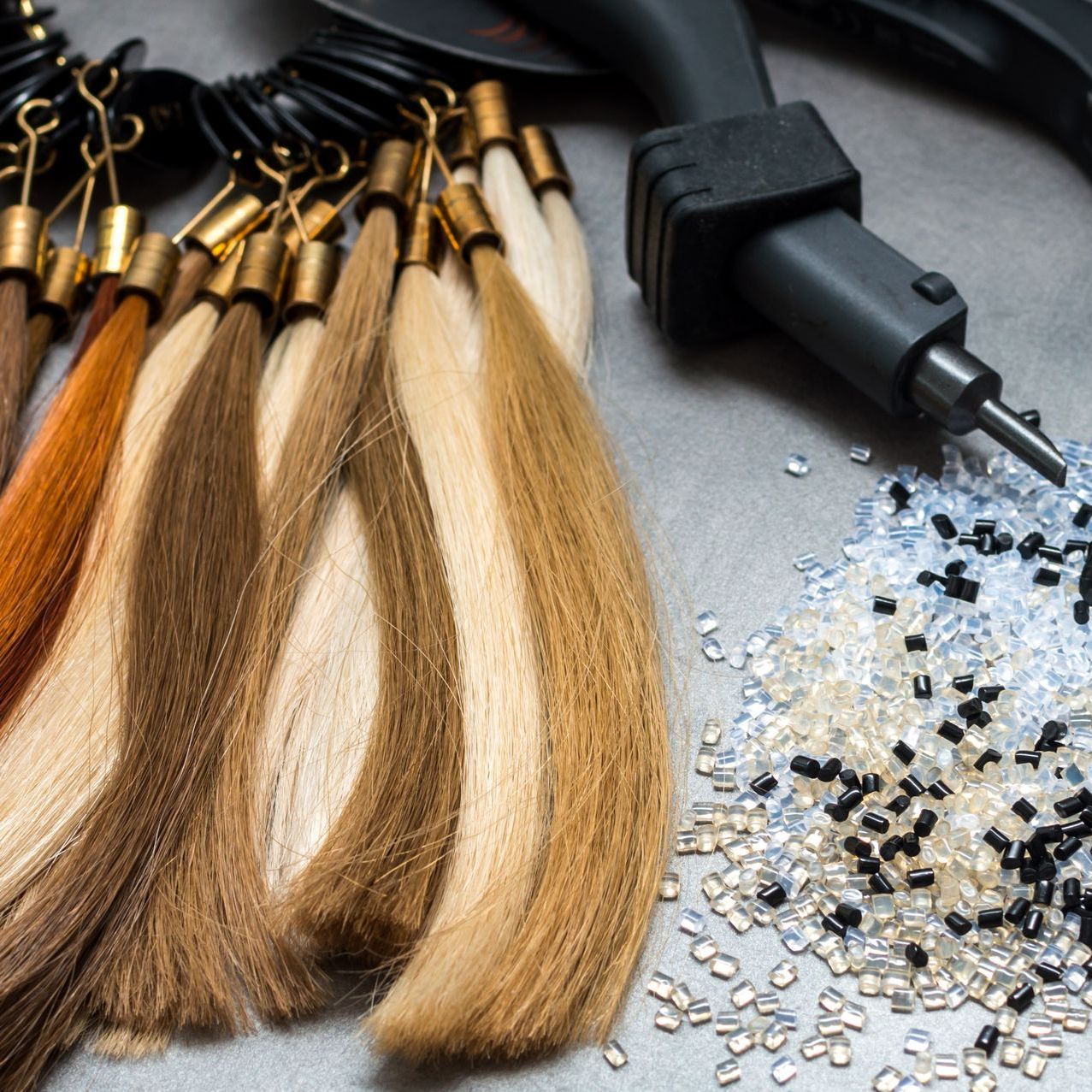 A bunch of hair extensions are sitting on a table