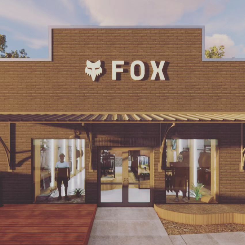 A brick building with the word fox on it