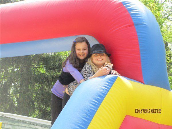 Two Little Girls in an Inflatable Slide — Columbus, OH — The Venice Club