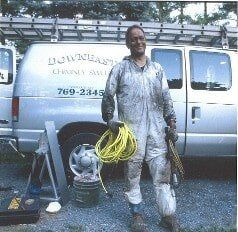 Employee With Dirty Overalls - Chimney Cleaning Services in Norwood, MA