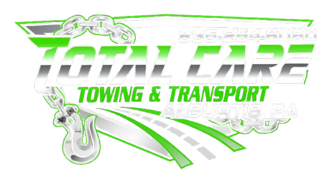 Logo for Total Care Towing & Transport, Augusta, GA; features green and gray text over a white background with a chain and hook graphic.