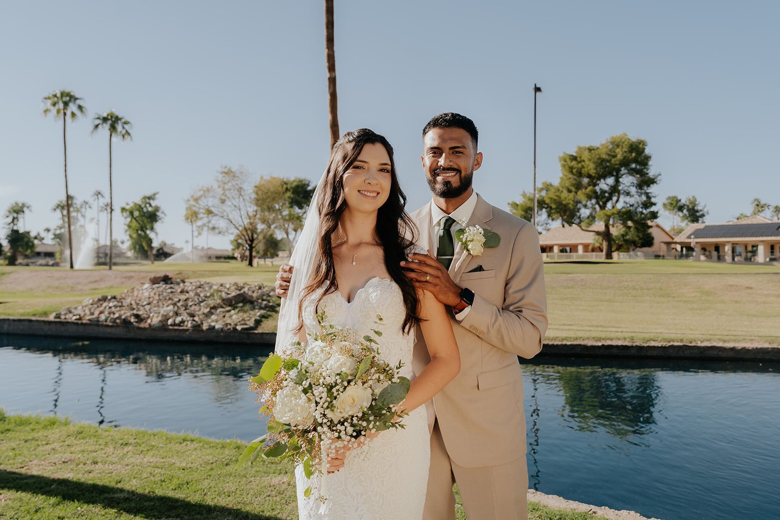 Bride and groom sharing a romantic photo during their wedding.