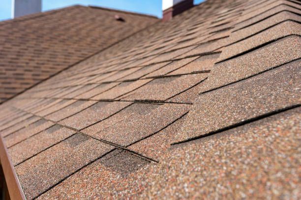 A close up of a roof with shingles on it.