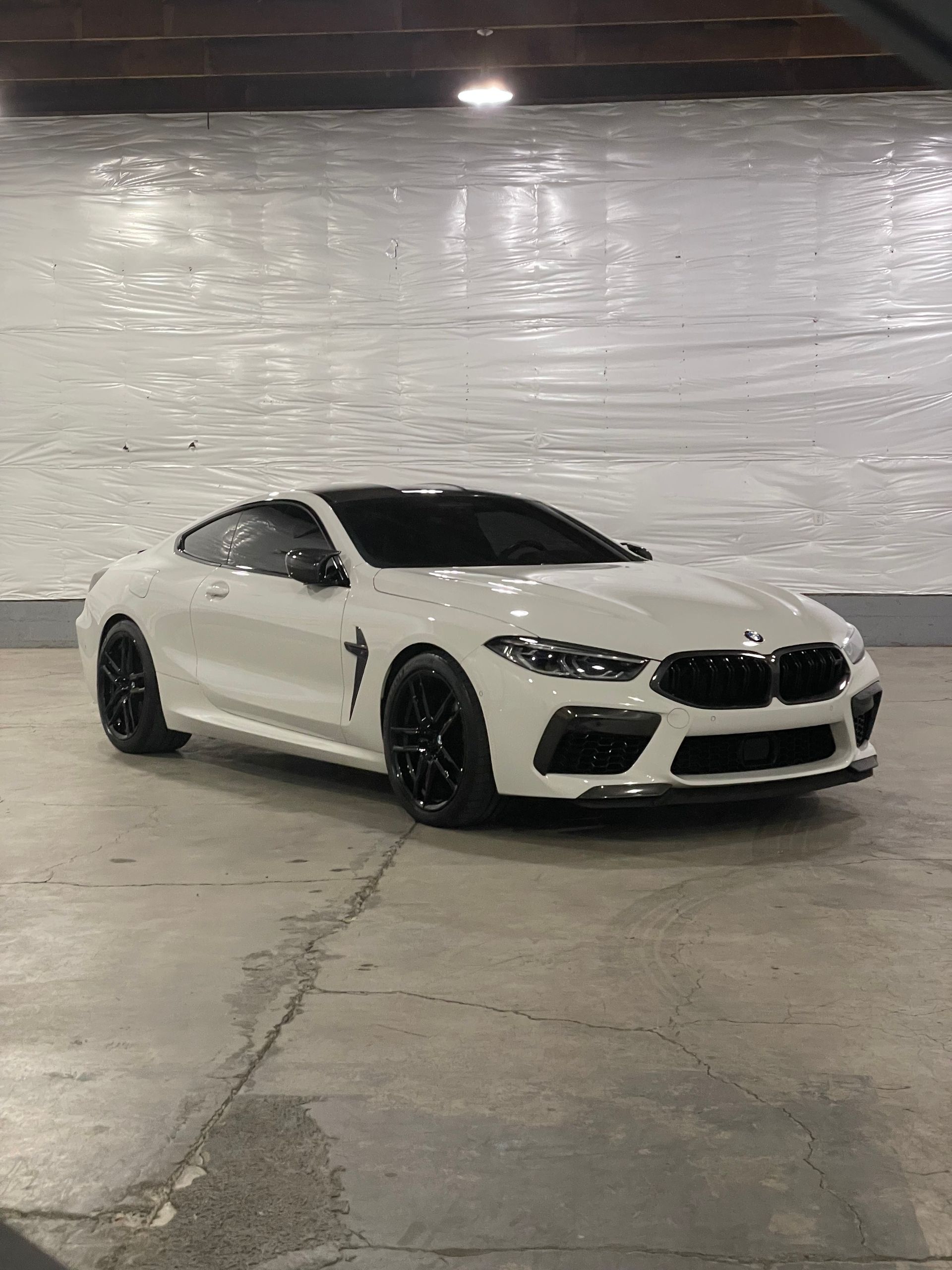 White BMW M8 Competitions Coupe with tinted windows installed and black wheels - South Salem, OR