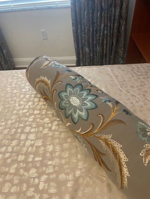 A couch with a lot of pillows on it