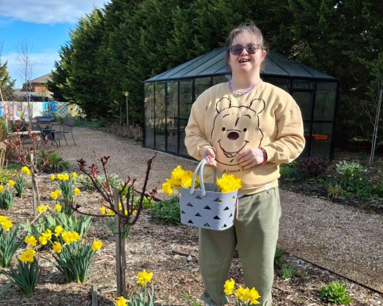 A Woman Sitting at a Table with a Painting on It | Ballarat, Vic | West End Support Services