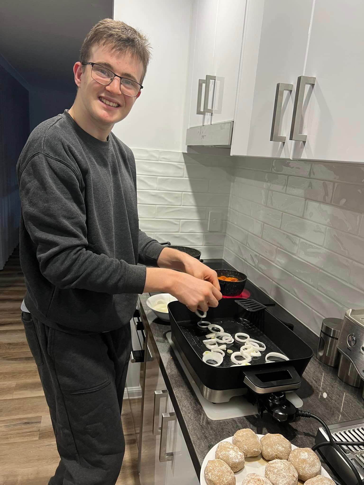 Man Cooking White Onions — Ballarat, VIC — West End Support Services
