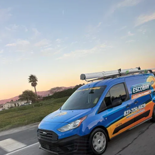 A blue and orange van for scobar custom plumbing