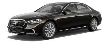 A dark brown Mercedes-Benz sedan. It has silver wheels and a chrome grille.