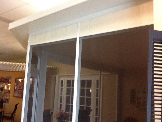 Solar Screen Windows Beside The Entrance – Kern County, CA – Bakersfield Patios Covers