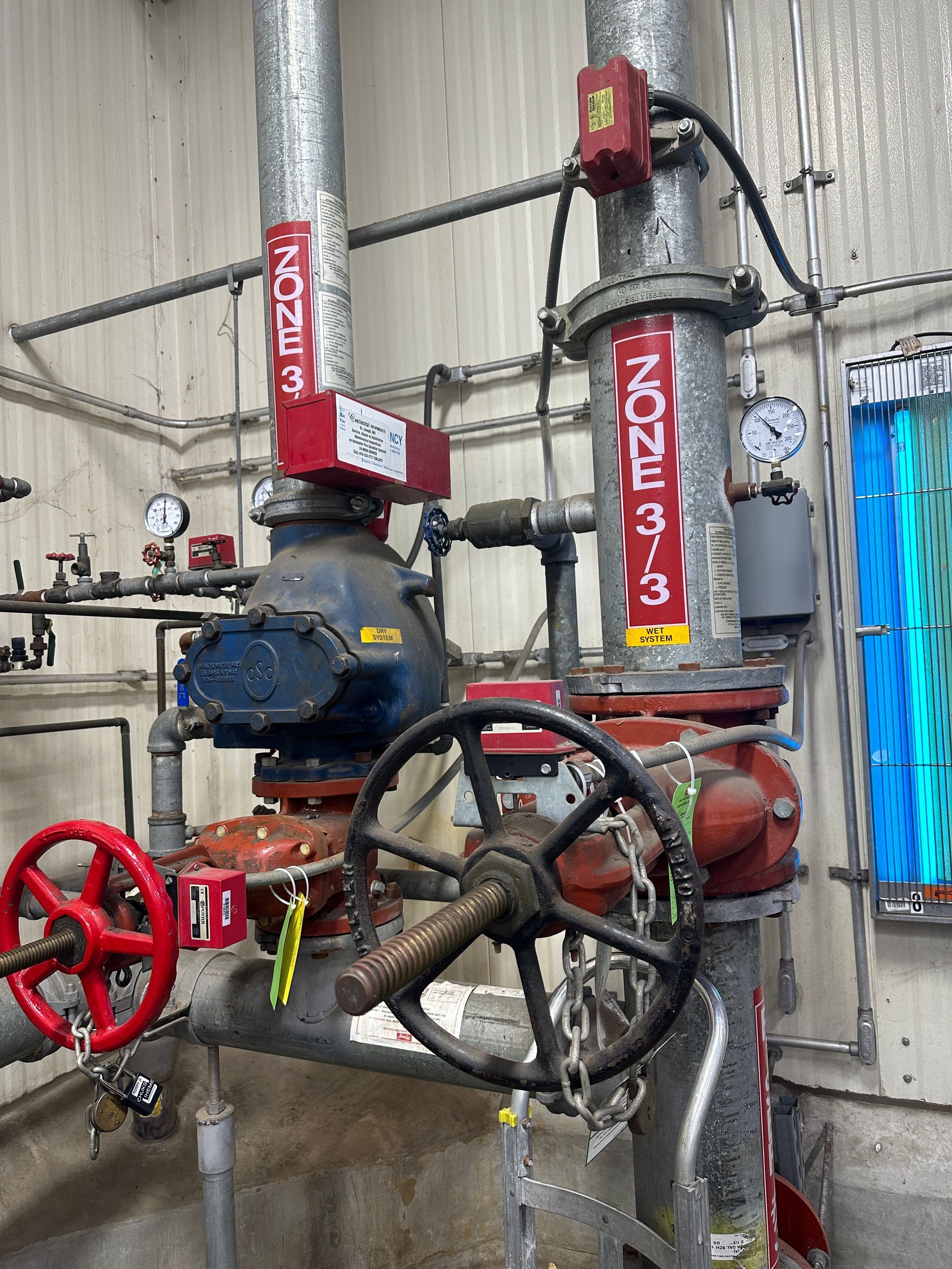 A room filled with lots of pipes and valves.