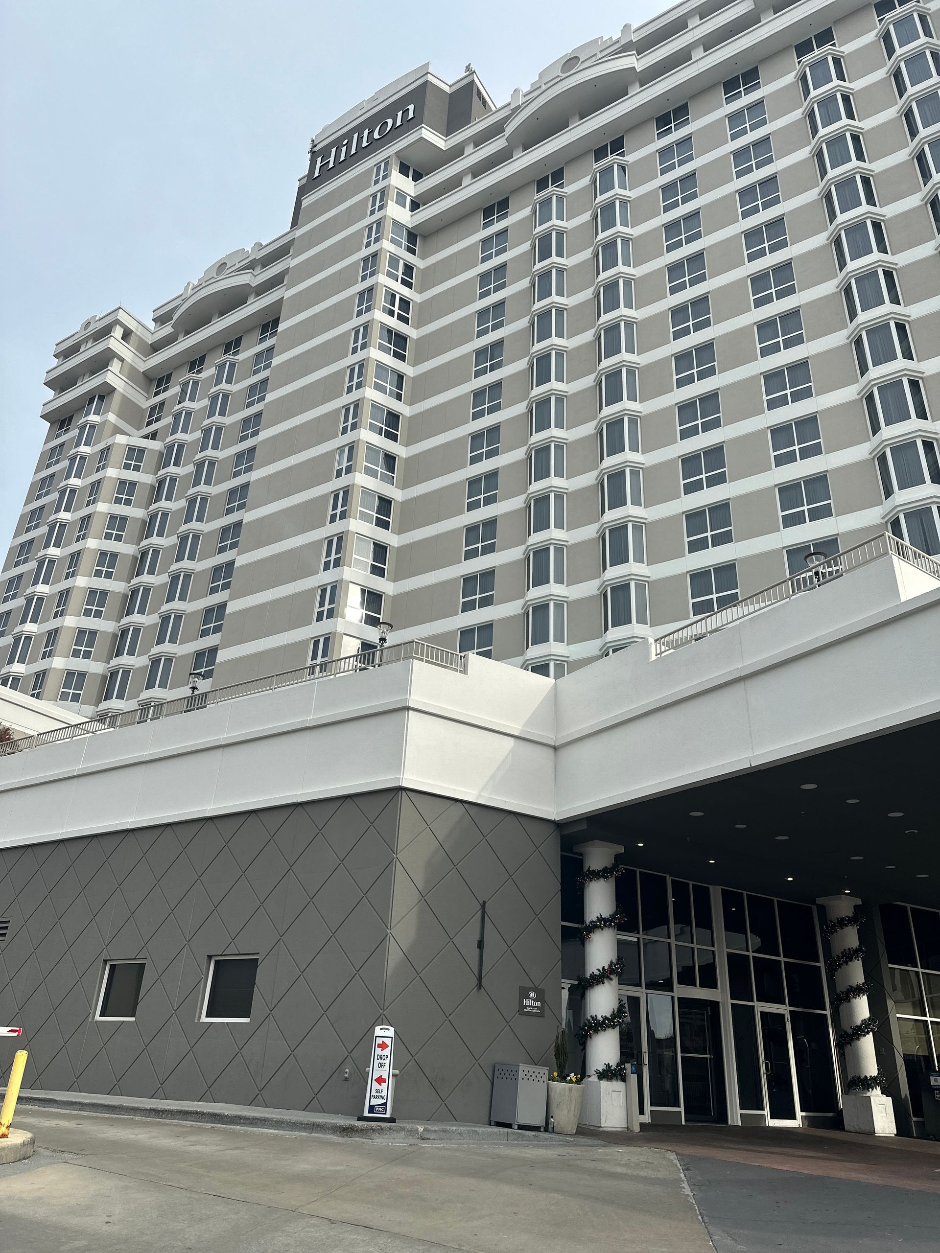 A large local building with a lot of windows and columns