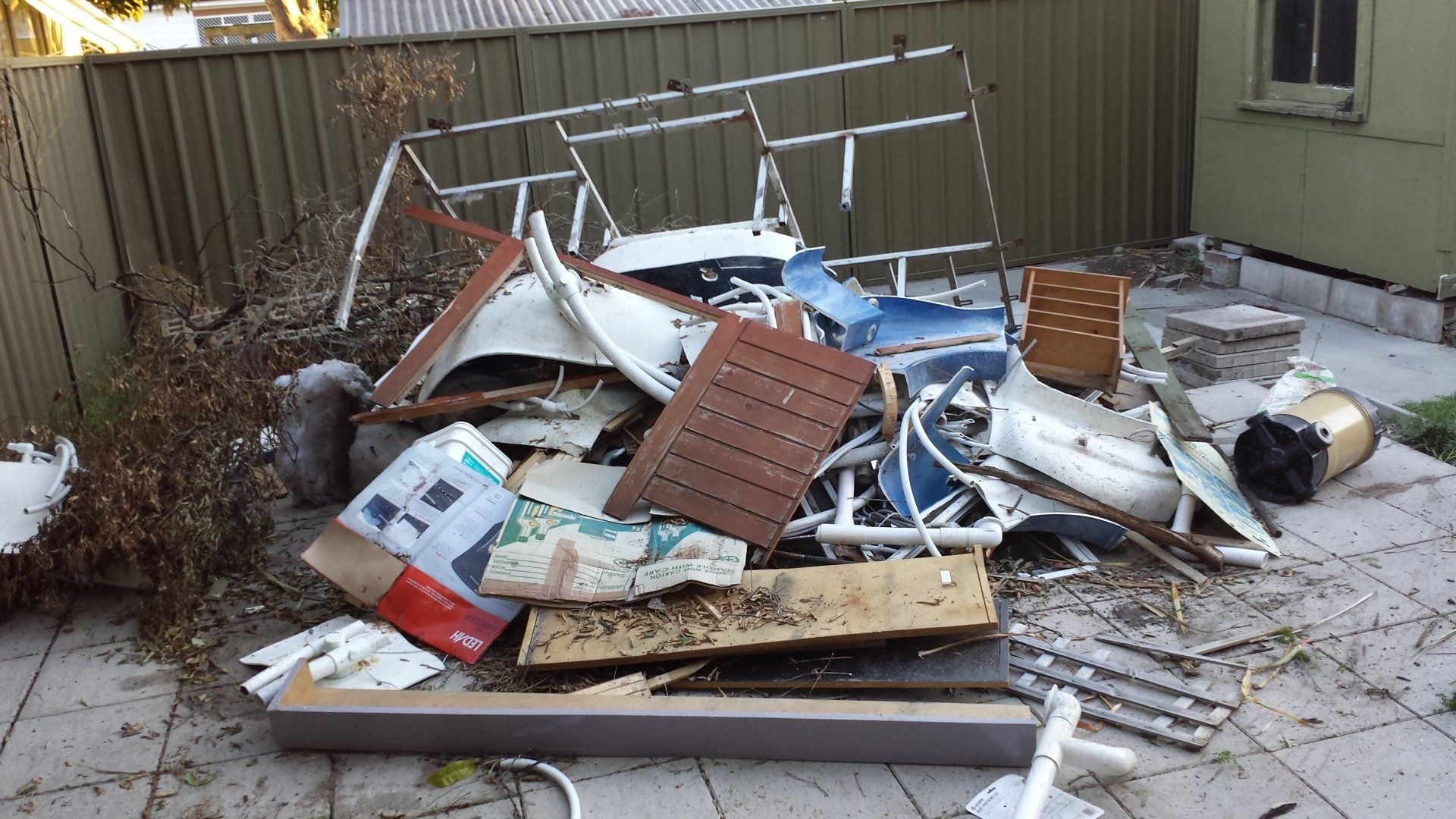 Residential Rubbish Before — Newcastle, NSW — Abate Rubbish Removal