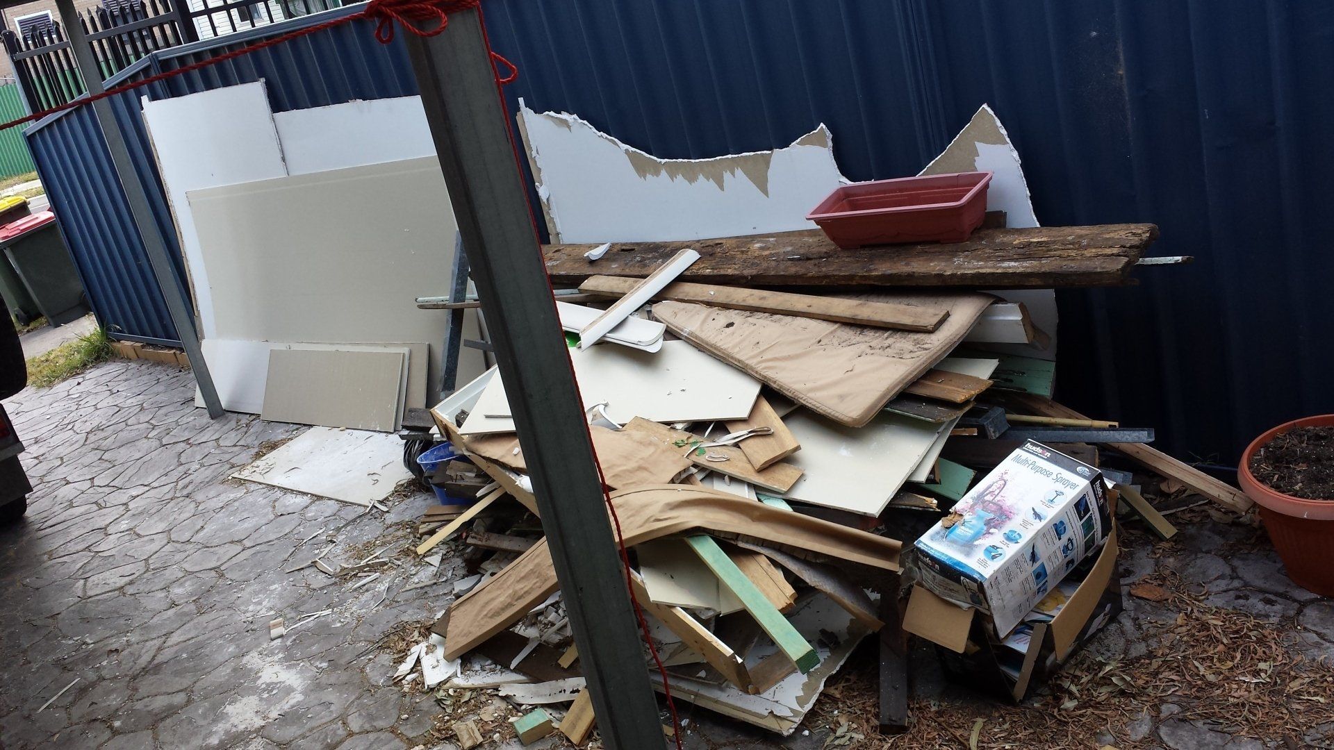 Home Rubbish Collection Before — Newcastle, NSW — Abate Rubbish Removal