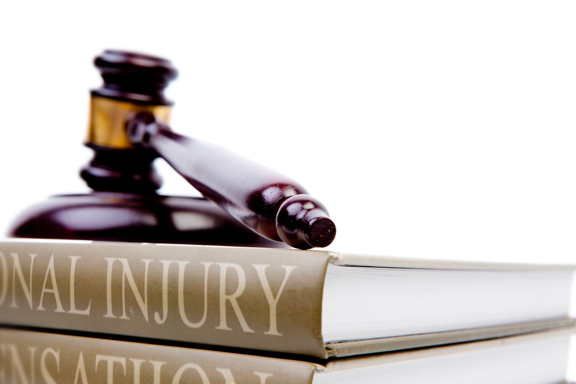 Personal Injury Attorney Services—Gavel and Law Book Representing Legal Services for Injury Cases.