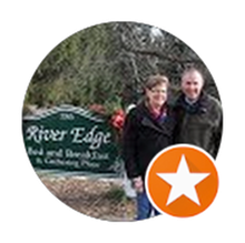 Couple standing by a 