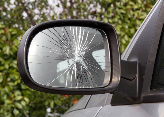 Auto Glass Cars — Damaged Rear View Mirror in San Antonio, TX Auto Glass Cars — Damaged Rear View Mirror in San Antonio, TX