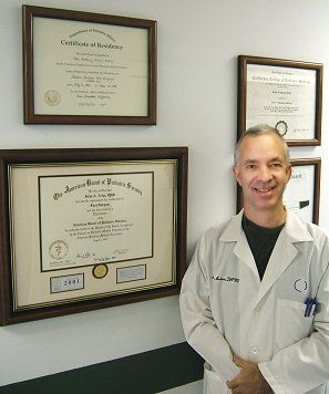 Orthotics — Dr. Ariza with his Diploma and Achievement in Reno, NV