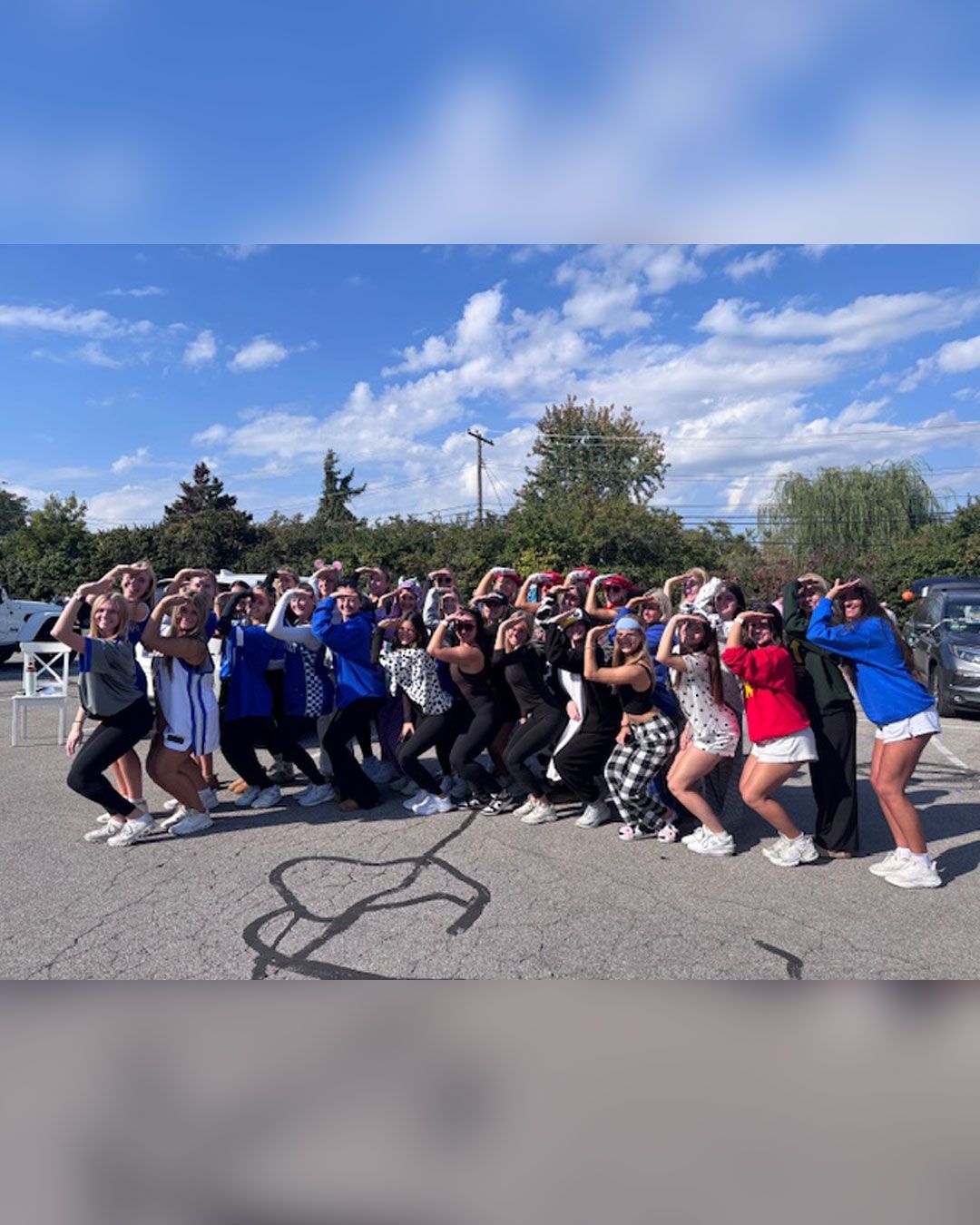 Volunteers from UK Delta Gamma pose for a photo.