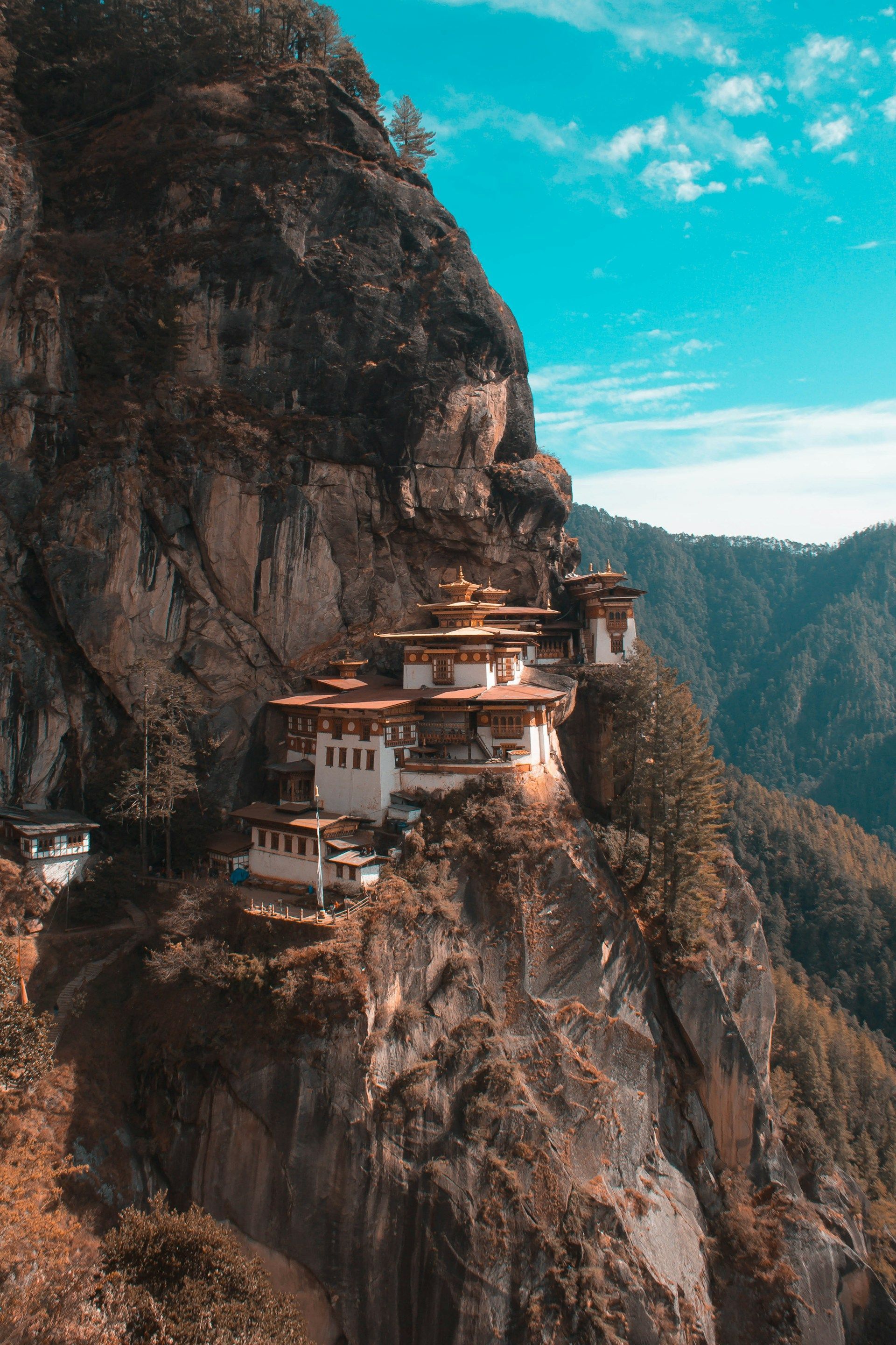 A group of buildings sitting on top of a mountain.