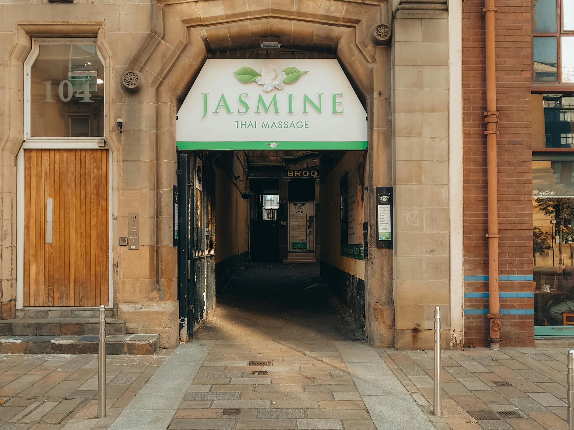 A building with a sign that says jasmine on it