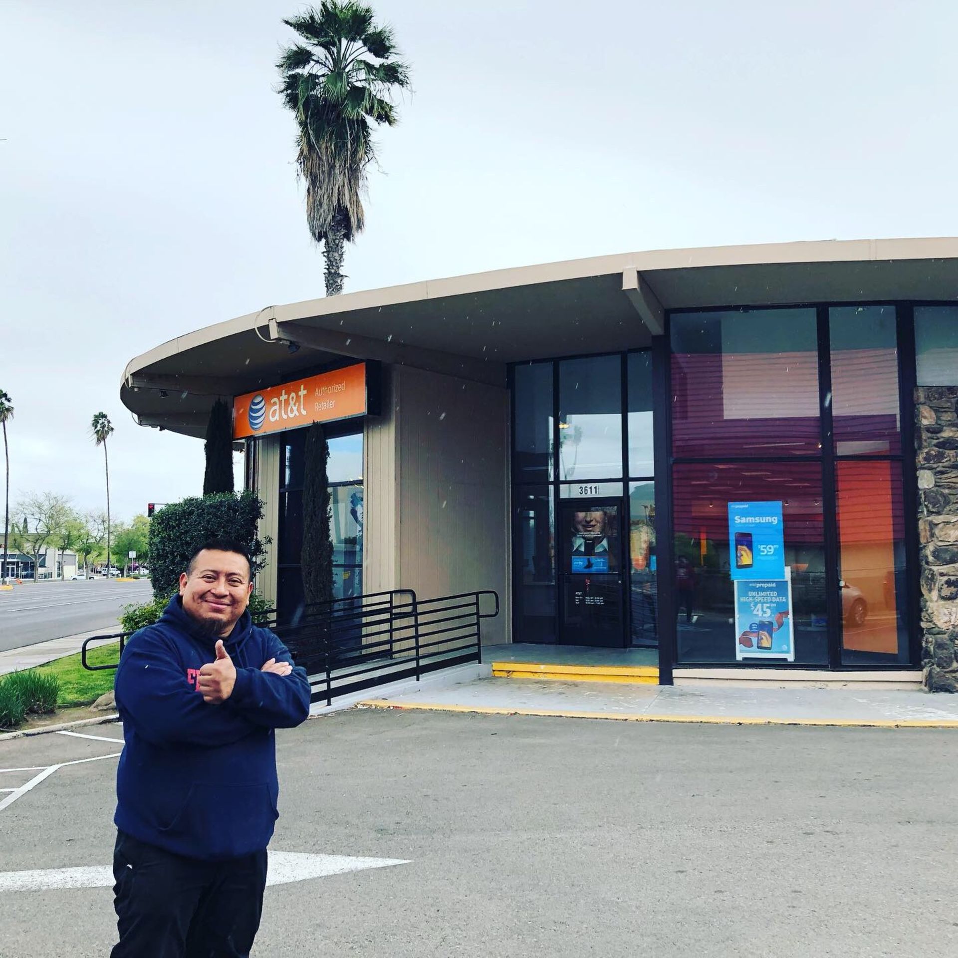 CMG Services owner taking selfie with the newly office they renovated