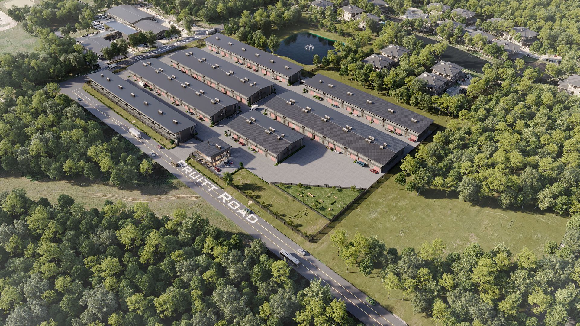 An aerial view of a large building surrounded by trees