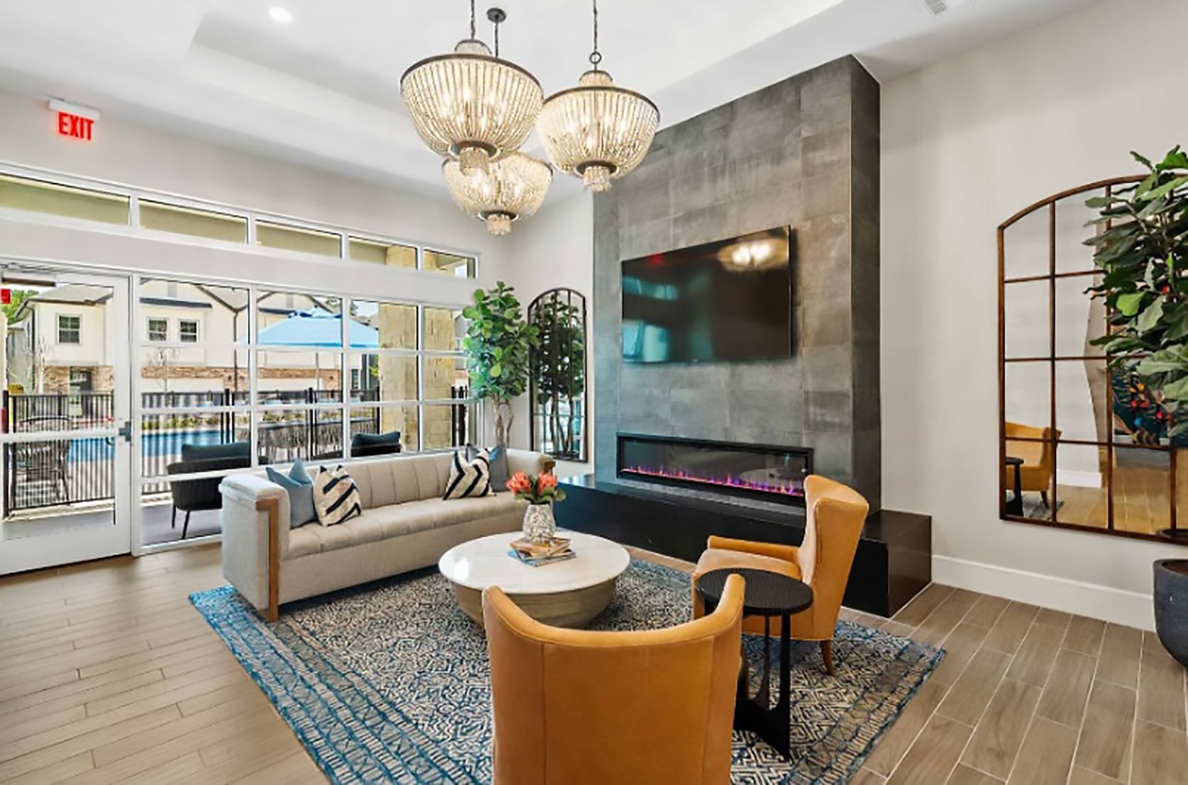 A living room filled with furniture and a fireplace.