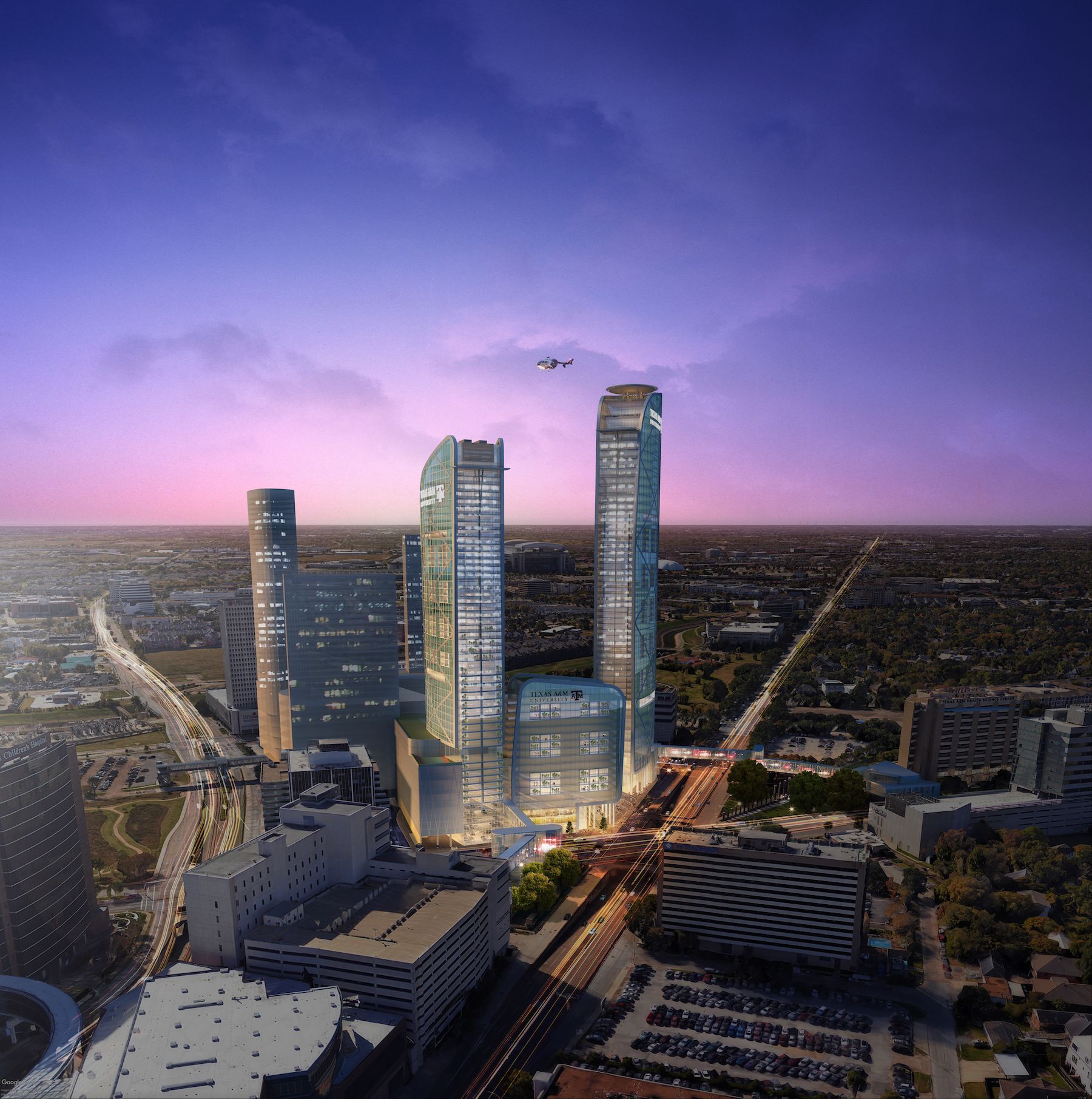 An aerial view of a city with a lot of tall buildings