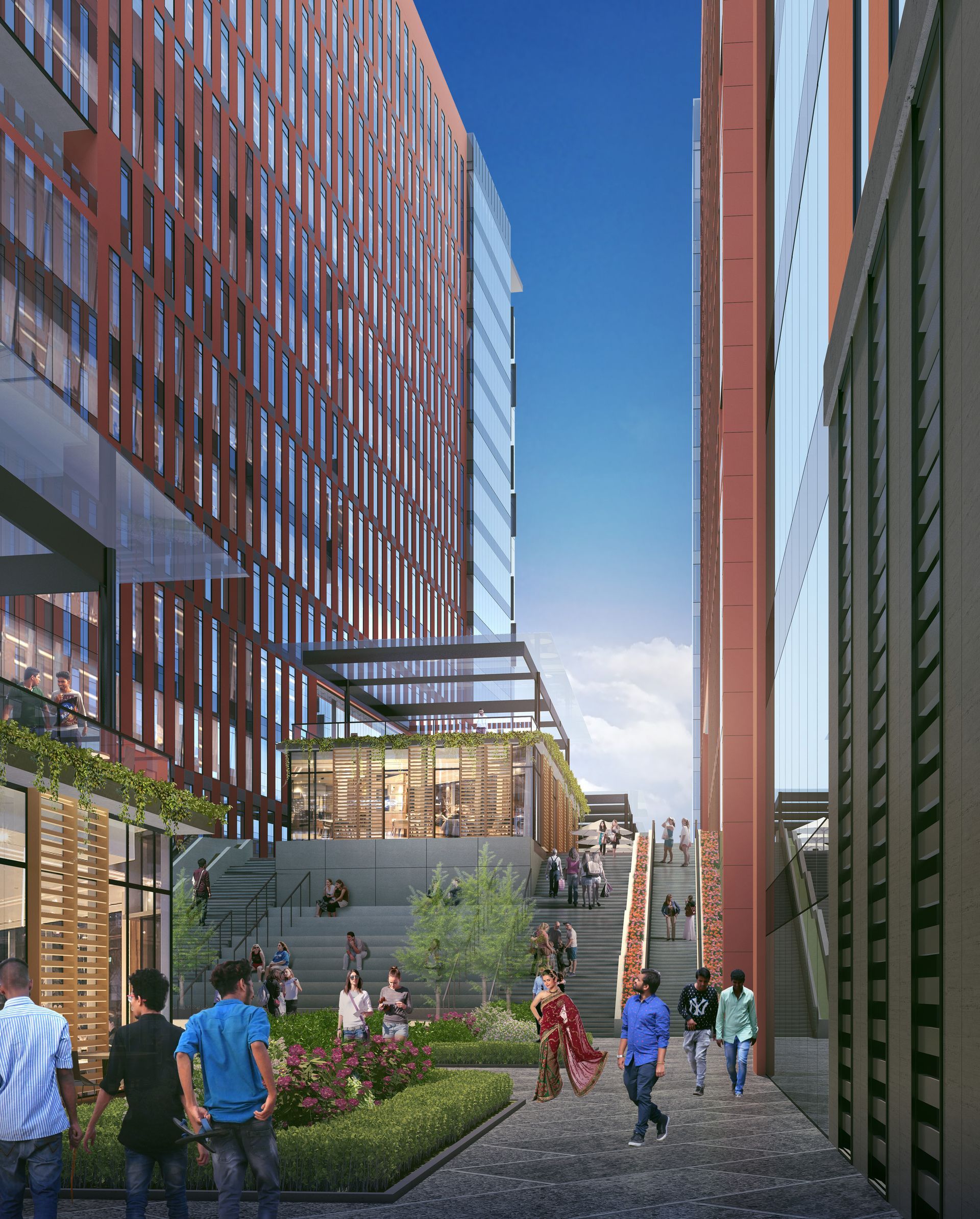 A group of people are walking between two tall buildings.