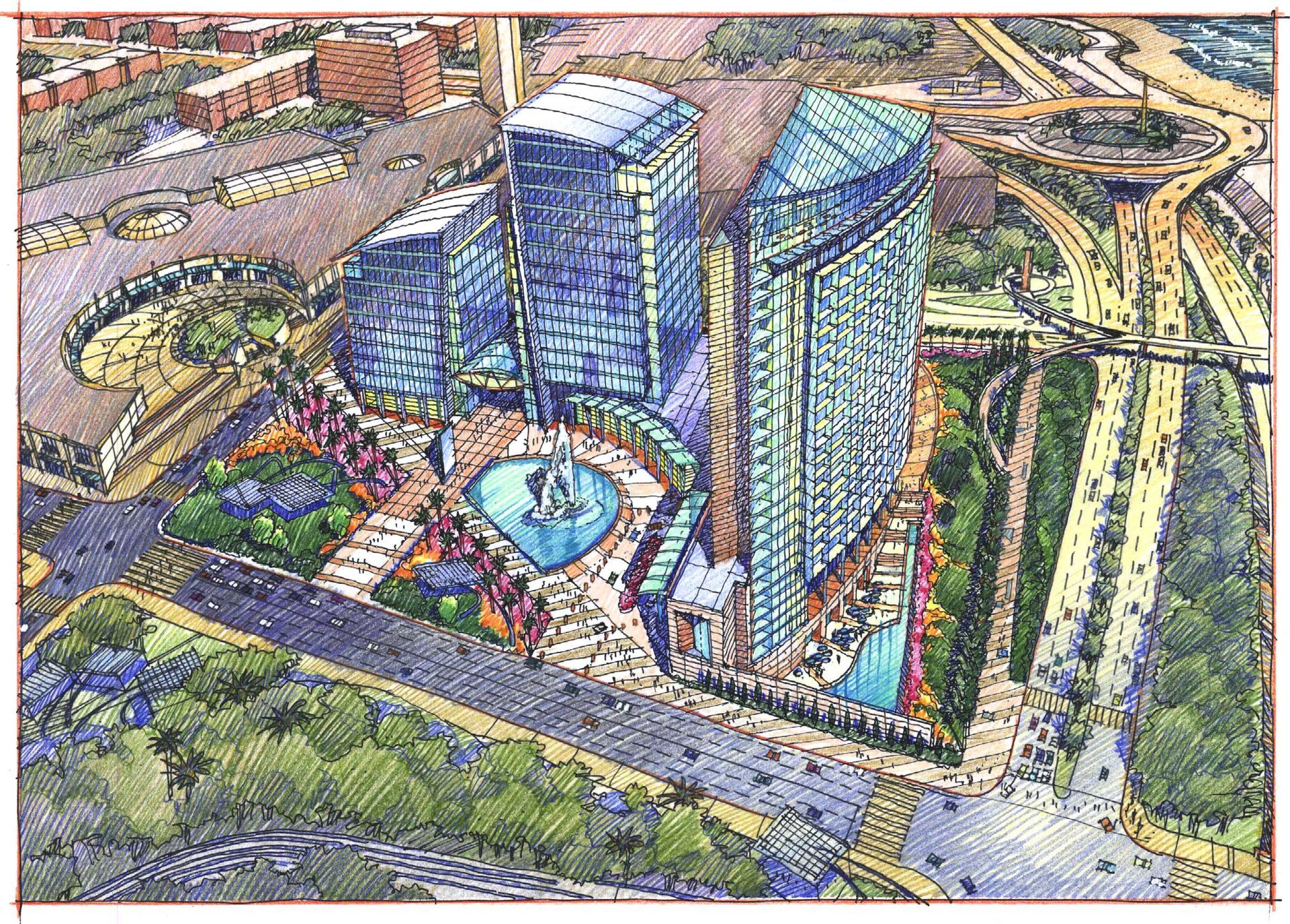 An aerial view of a large building with a fountain in the middle