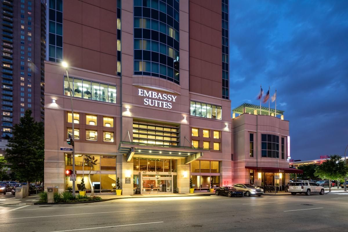A large building with a lot of windows is called the embassy suites.