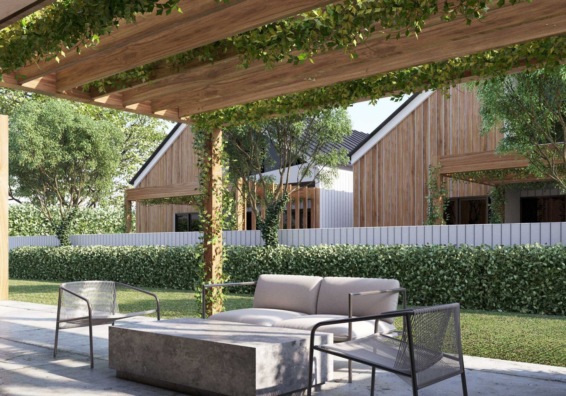 A patio with a couch , chairs and a table under a pergola.