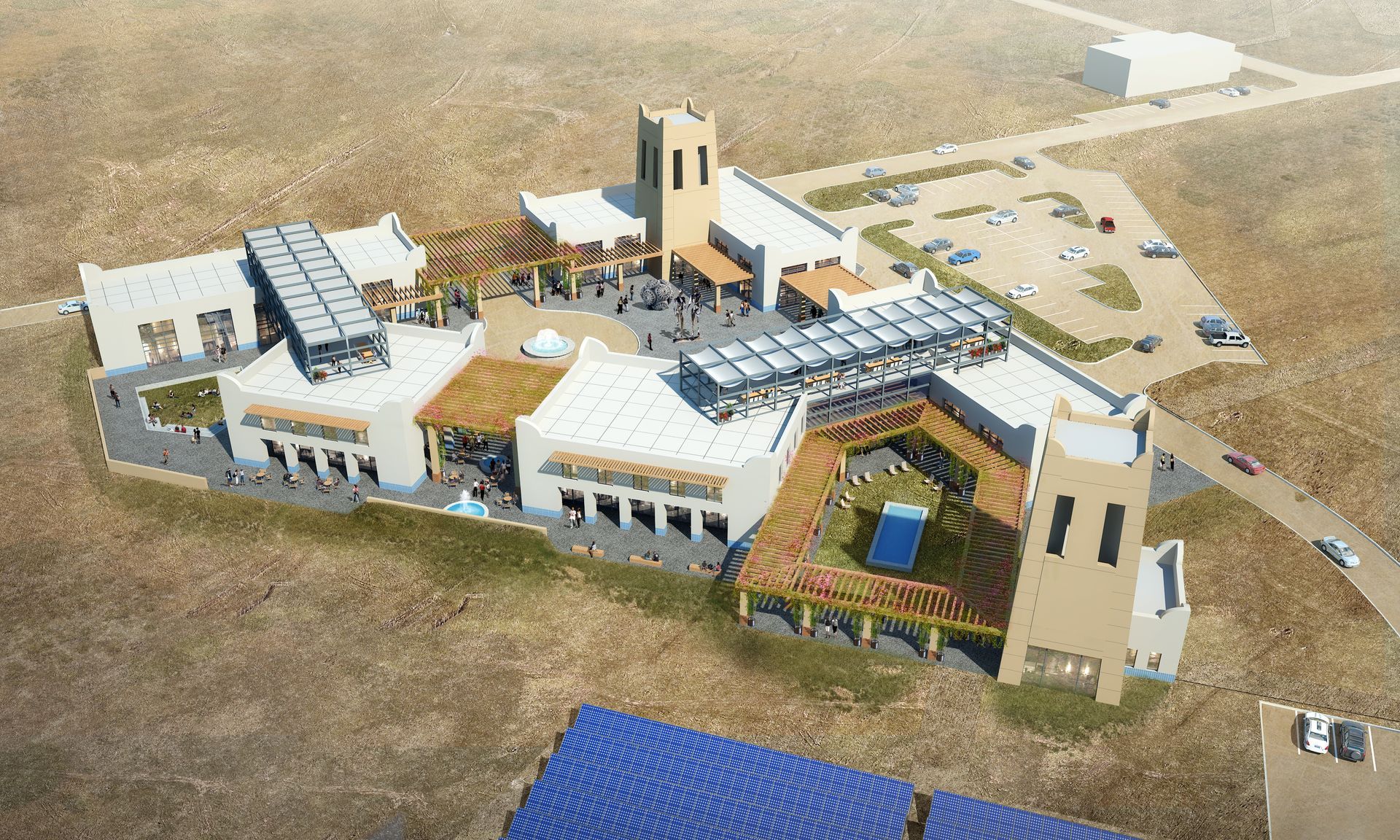 An aerial view of a large building in the middle of a desert