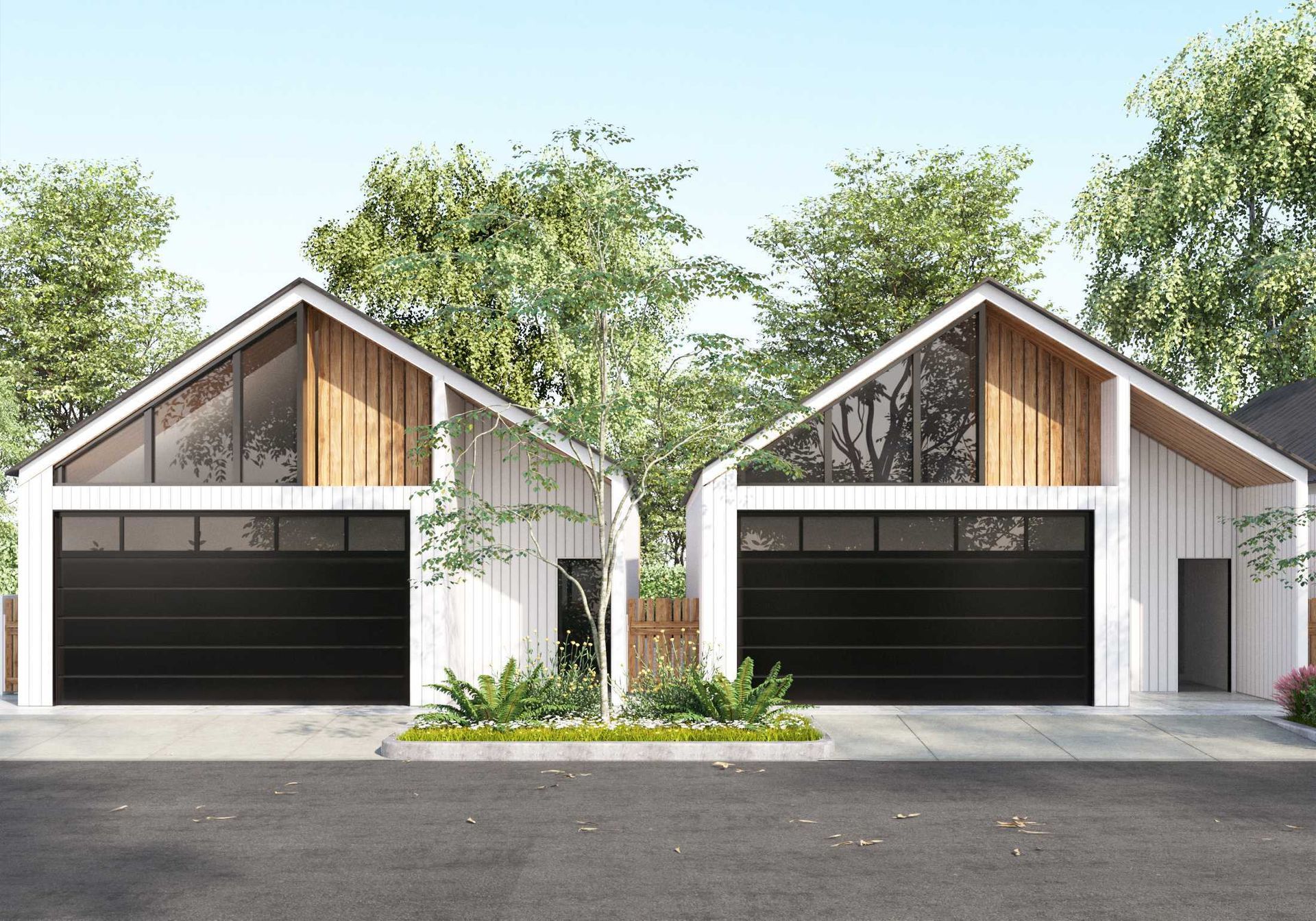 Two white houses with black garage doors are next to each other.