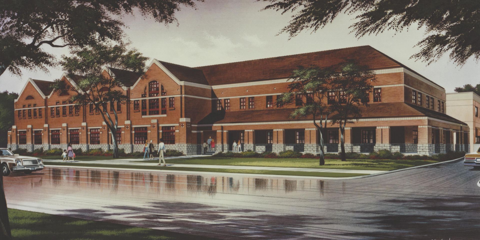 A large brick building with a red tile roof