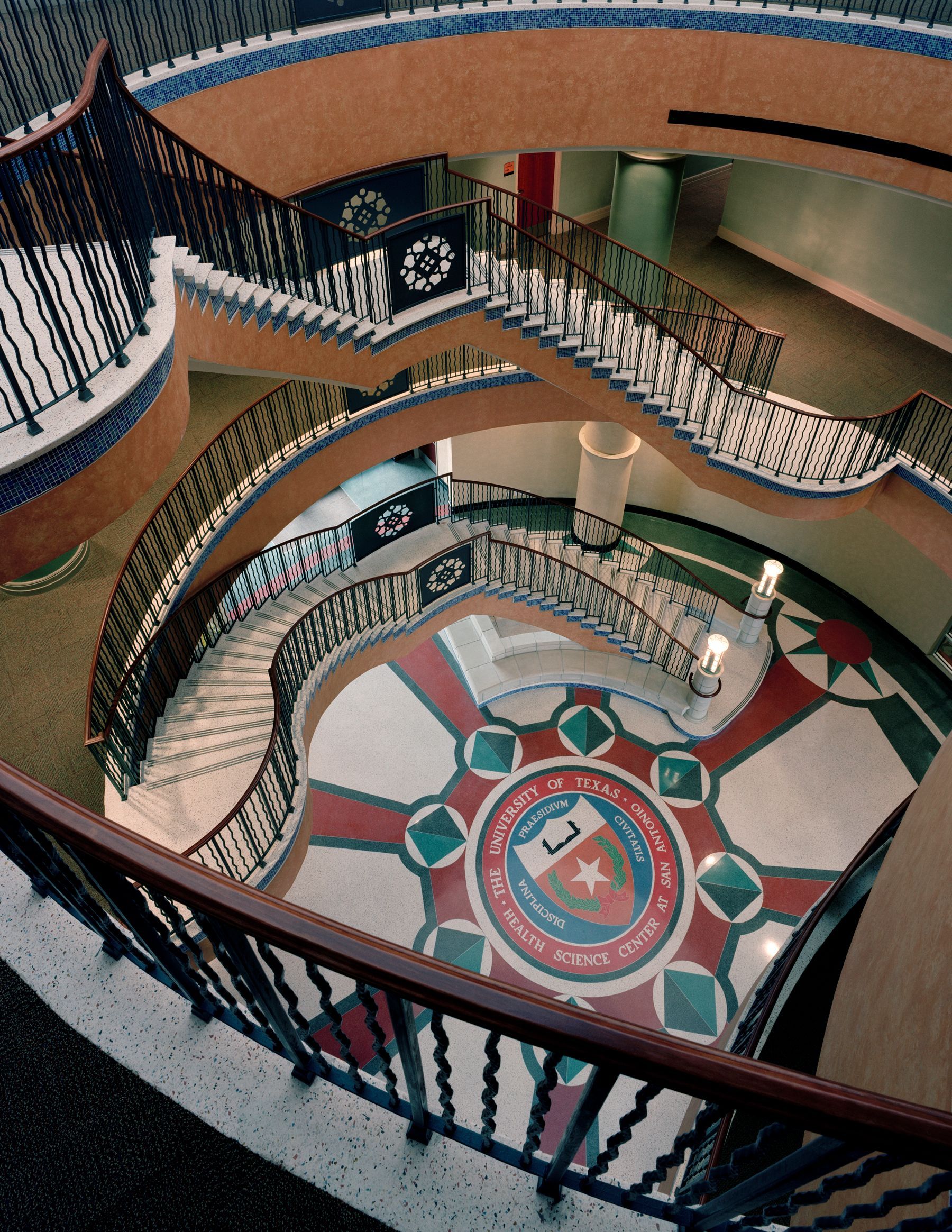 An aerial view of a circular staircase in a building