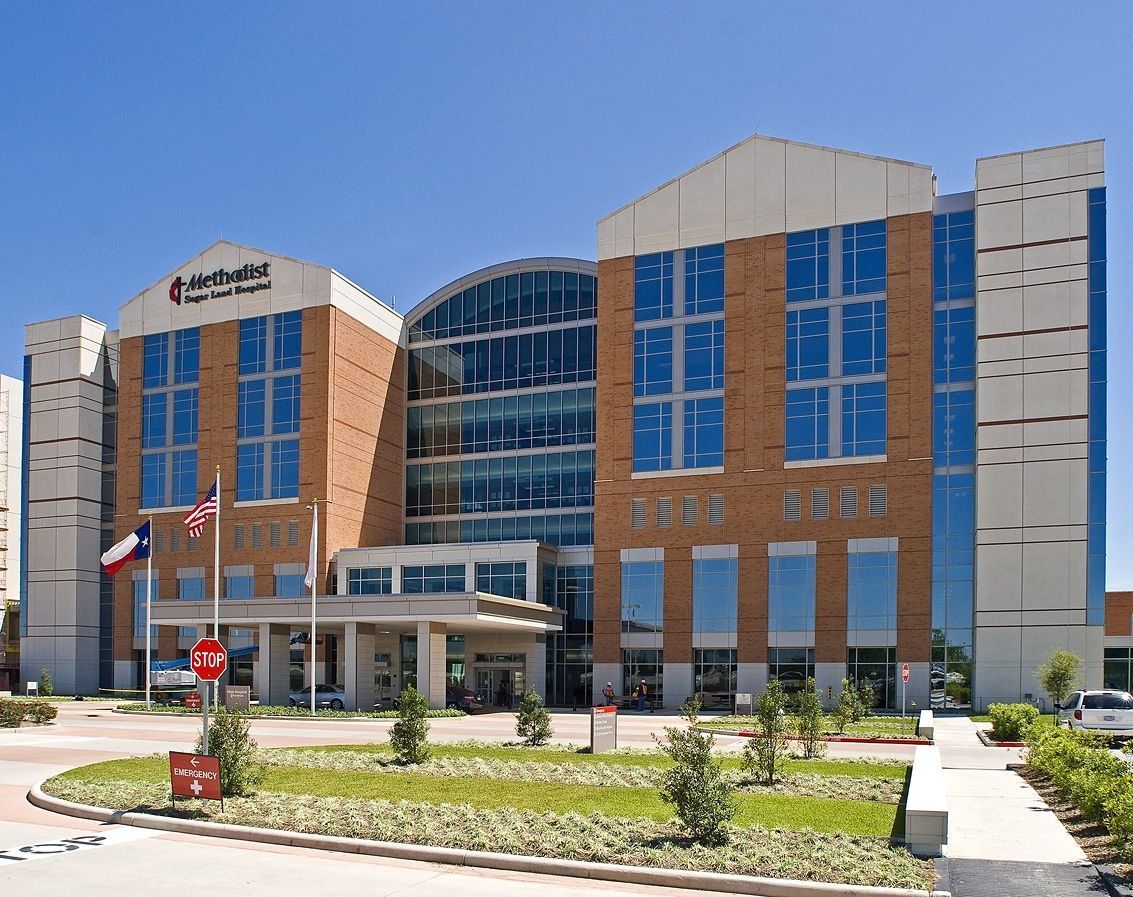 A large building with a lot of windows and the word sss on it