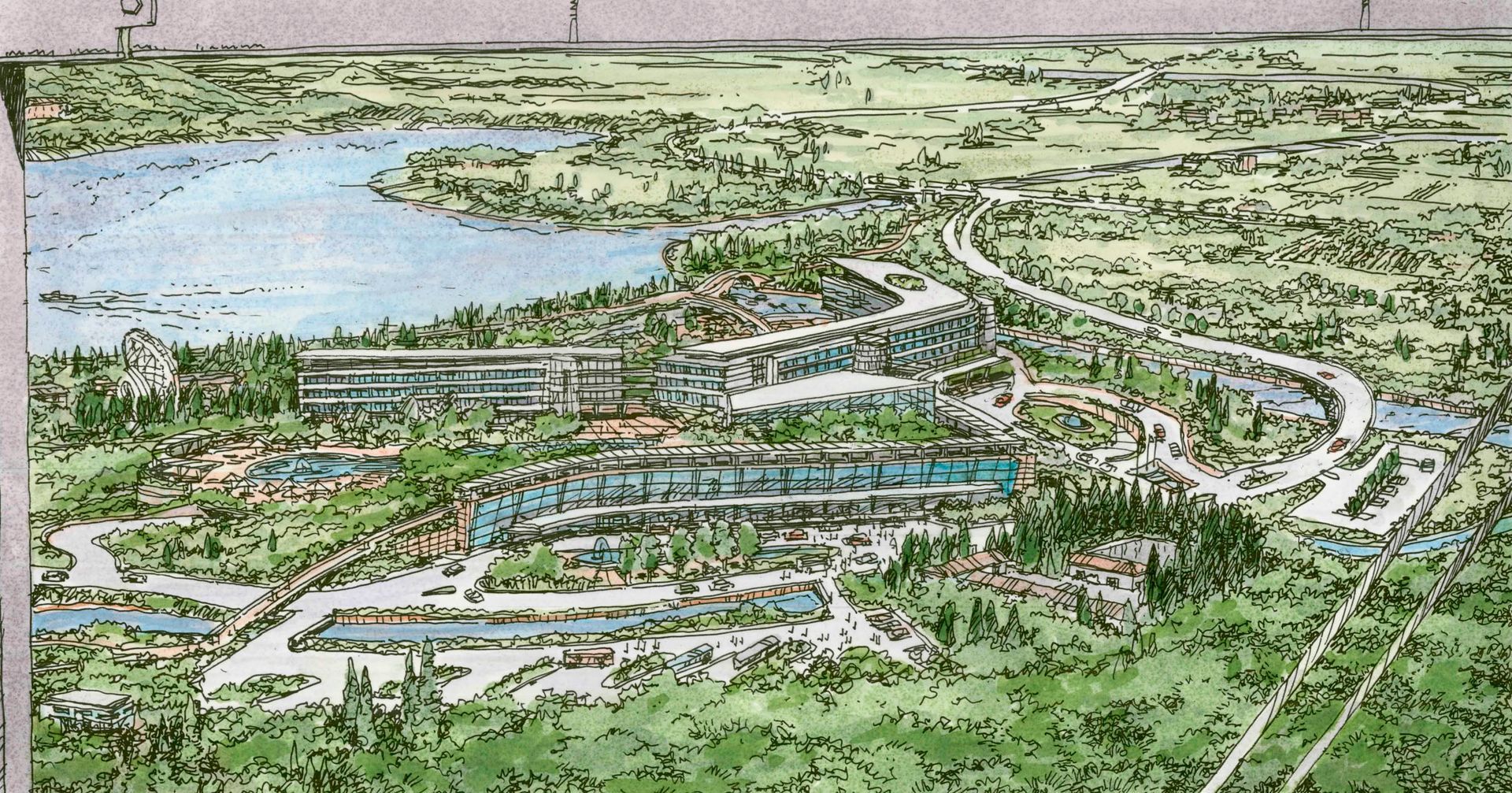 An aerial view of a city with a lake in the background