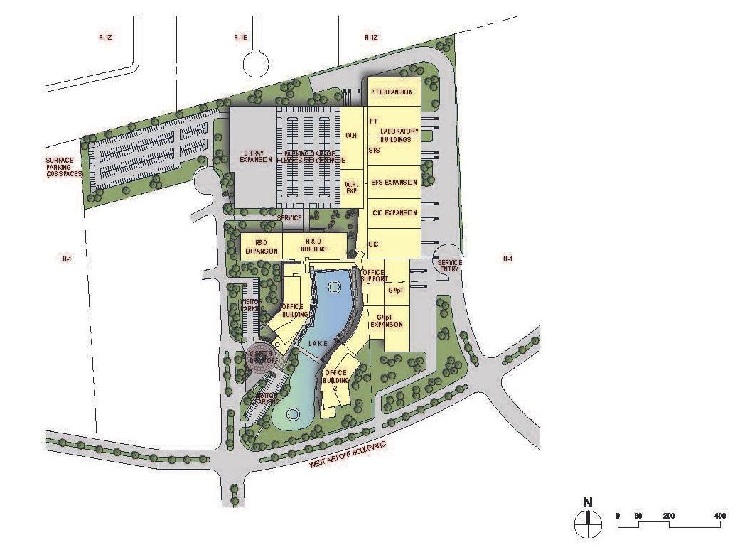 An aerial view of a large building with lots of buildings