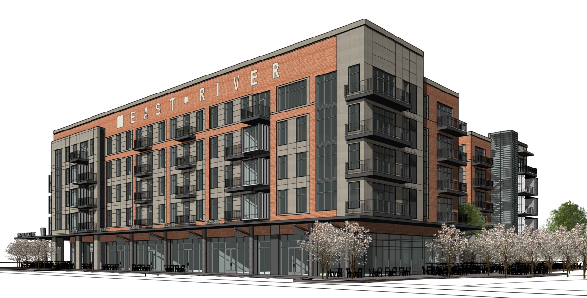 A large brick building with a lot of windows on a white background.