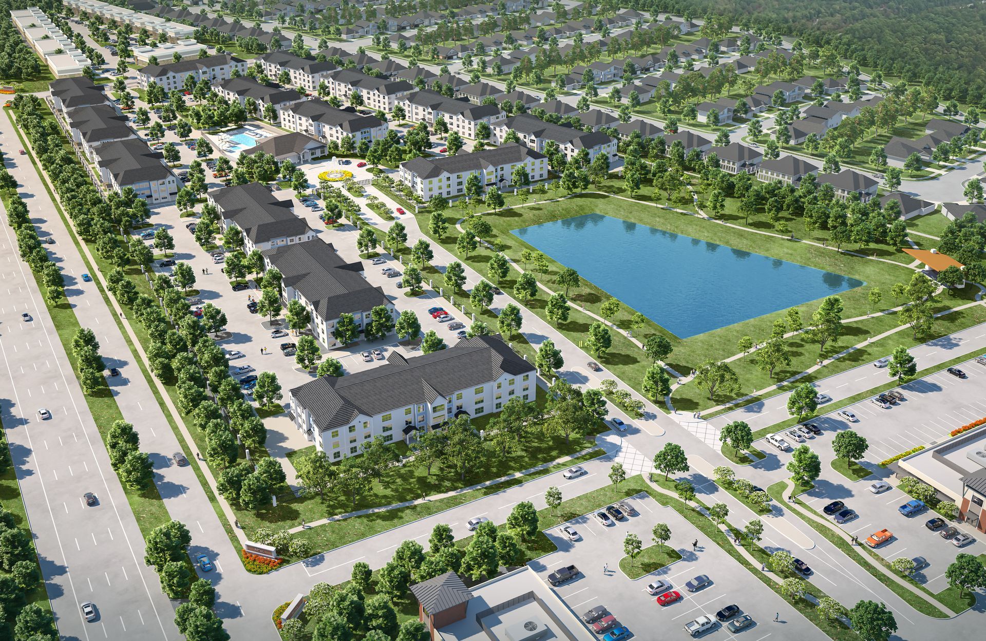 An aerial view of a residential area with a lake in the middle