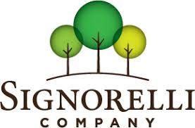 The logo for signorelli company has three trees on it.
