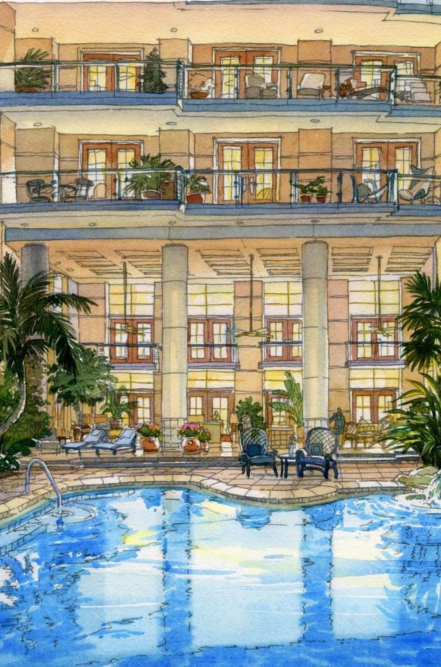 A large building with a swimming pool in front of it