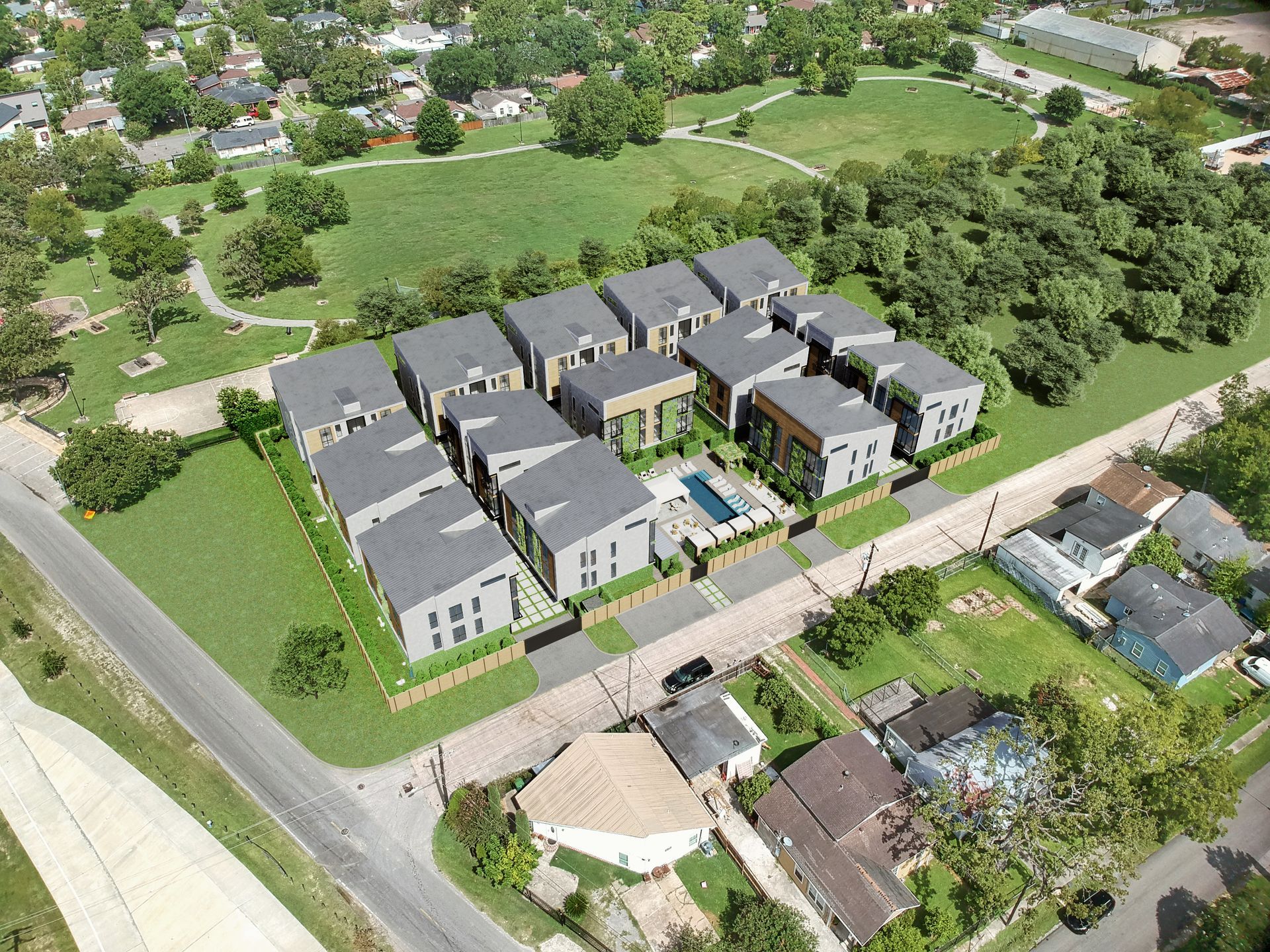An aerial view of a residential area with lots of houses and trees