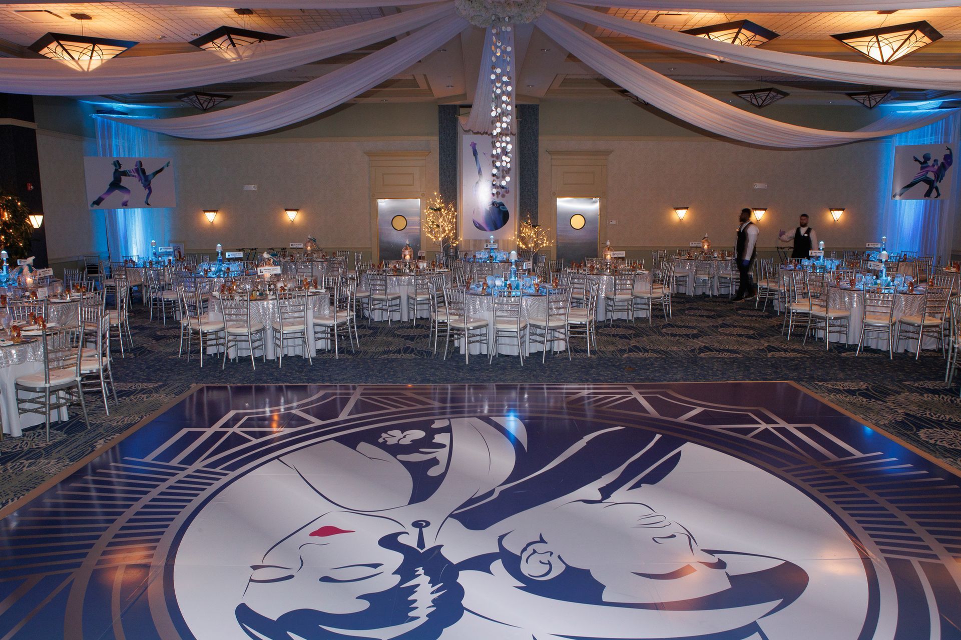 A dance floor with a picture of a man and woman on it