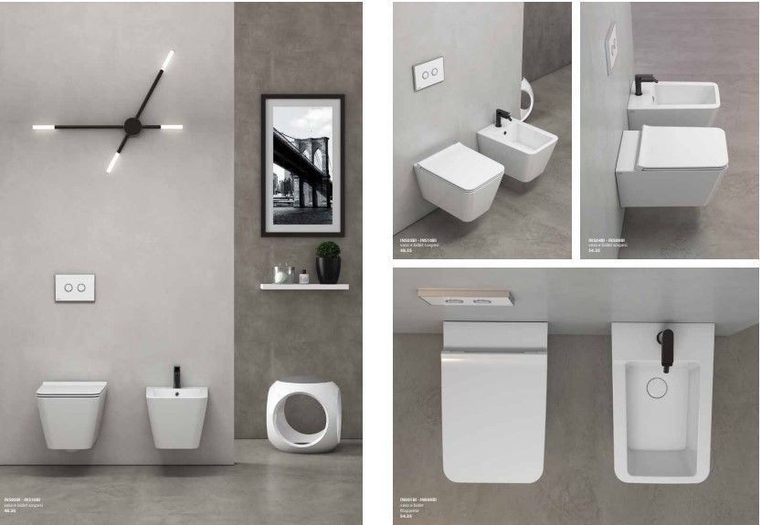 Un bagno con wc, bidet, lavandino e specchio.